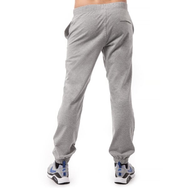 Spodnie dresowe męskie NIKE SPODNIE CRUSADER CUFF PANT 2 637764063 kolor szary