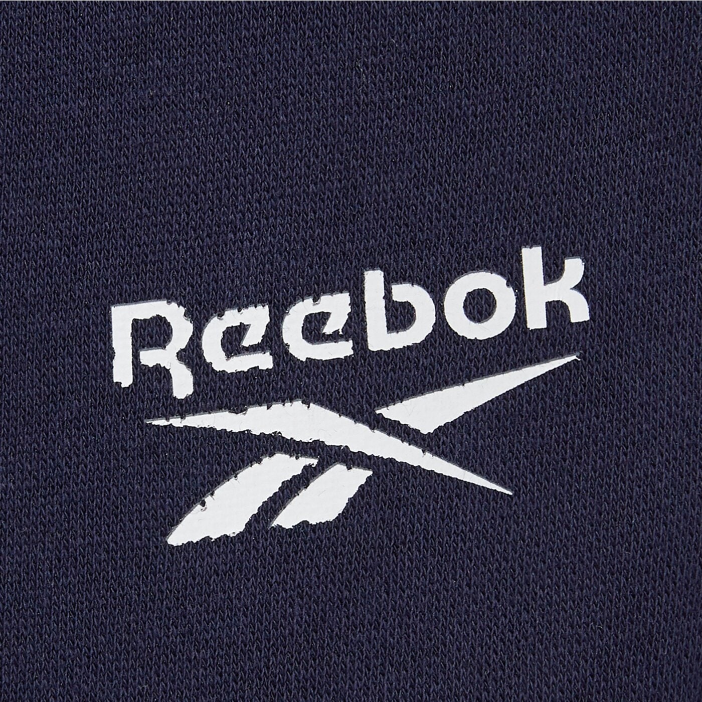 Spodnie dresowe męskie REEBOK SPODNIE ANDRE SMALL LOGO CUFFED PANT 100240235 kolor granatowy