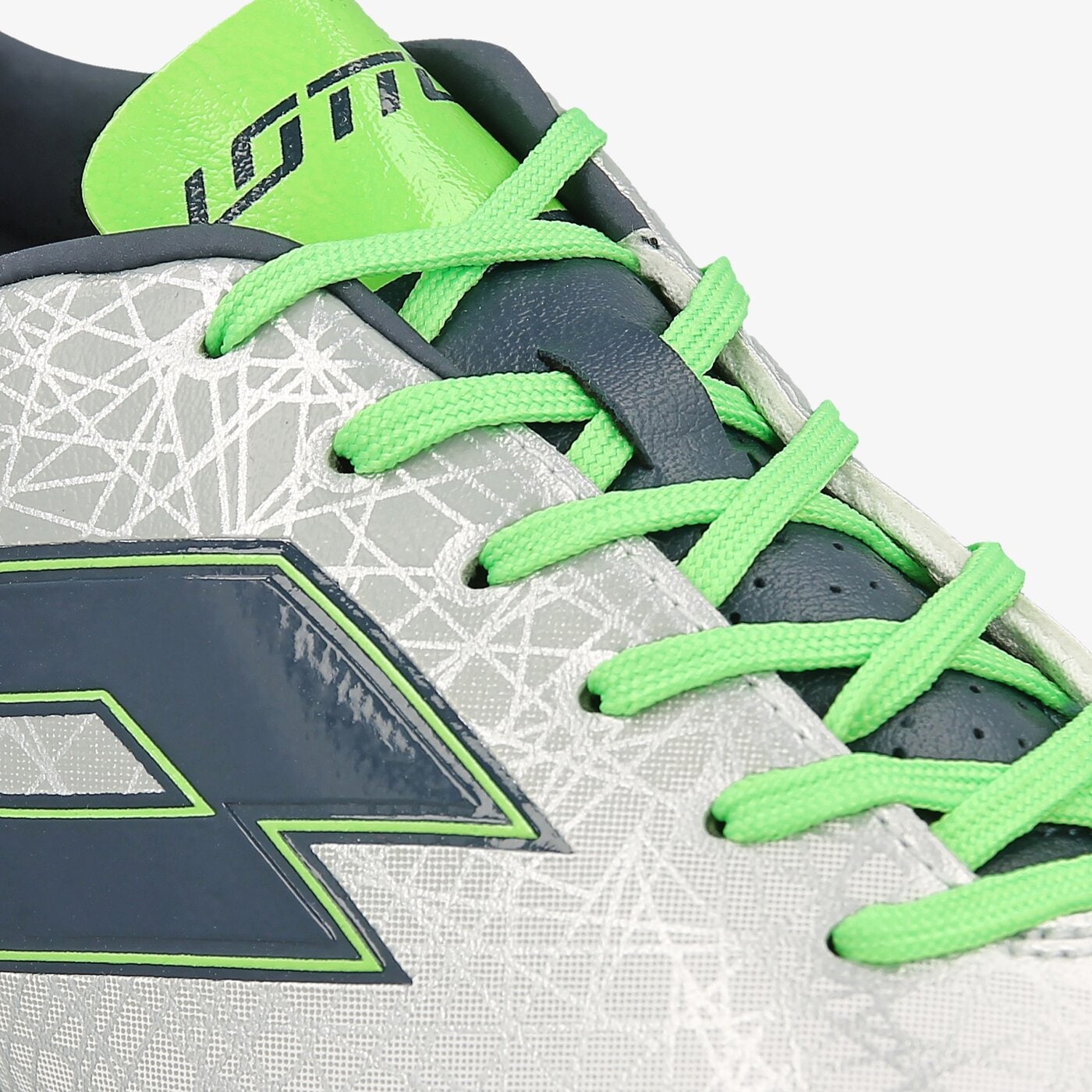 Buty piłkarskie męskie LOTTO LZG VIII 700 FGT s7148 kolor srebrny