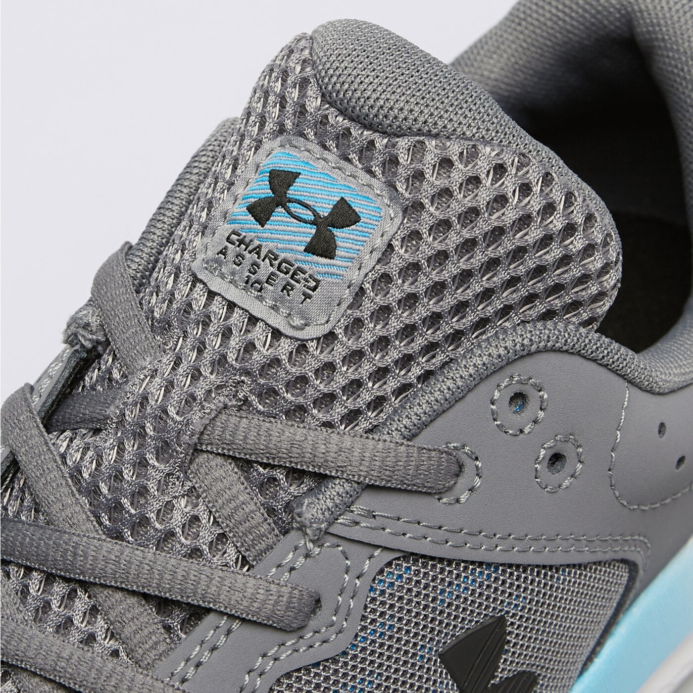 Buty do biegania dla dzieci UNDER ARMOUR BGS ASSERT 10 3026182024 kolor szary