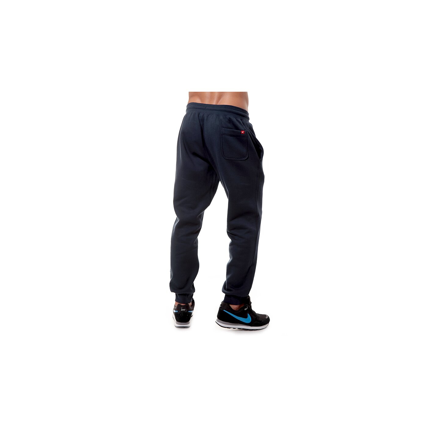 Spodnie dresowe męskie NIKE SPODNIE AW77 CUFF FL PANT 598871476 kolor granatowy