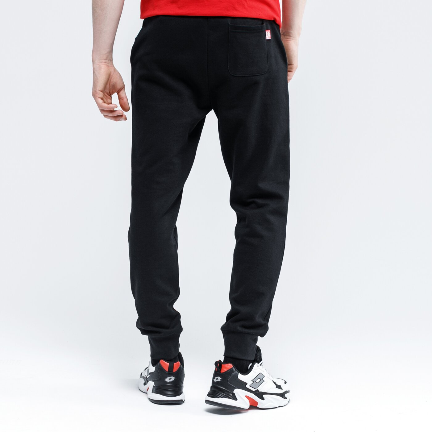 Spodnie dresowe męskie UMBRO SPODNIE ARBON ul120spm28001 kolor czarny