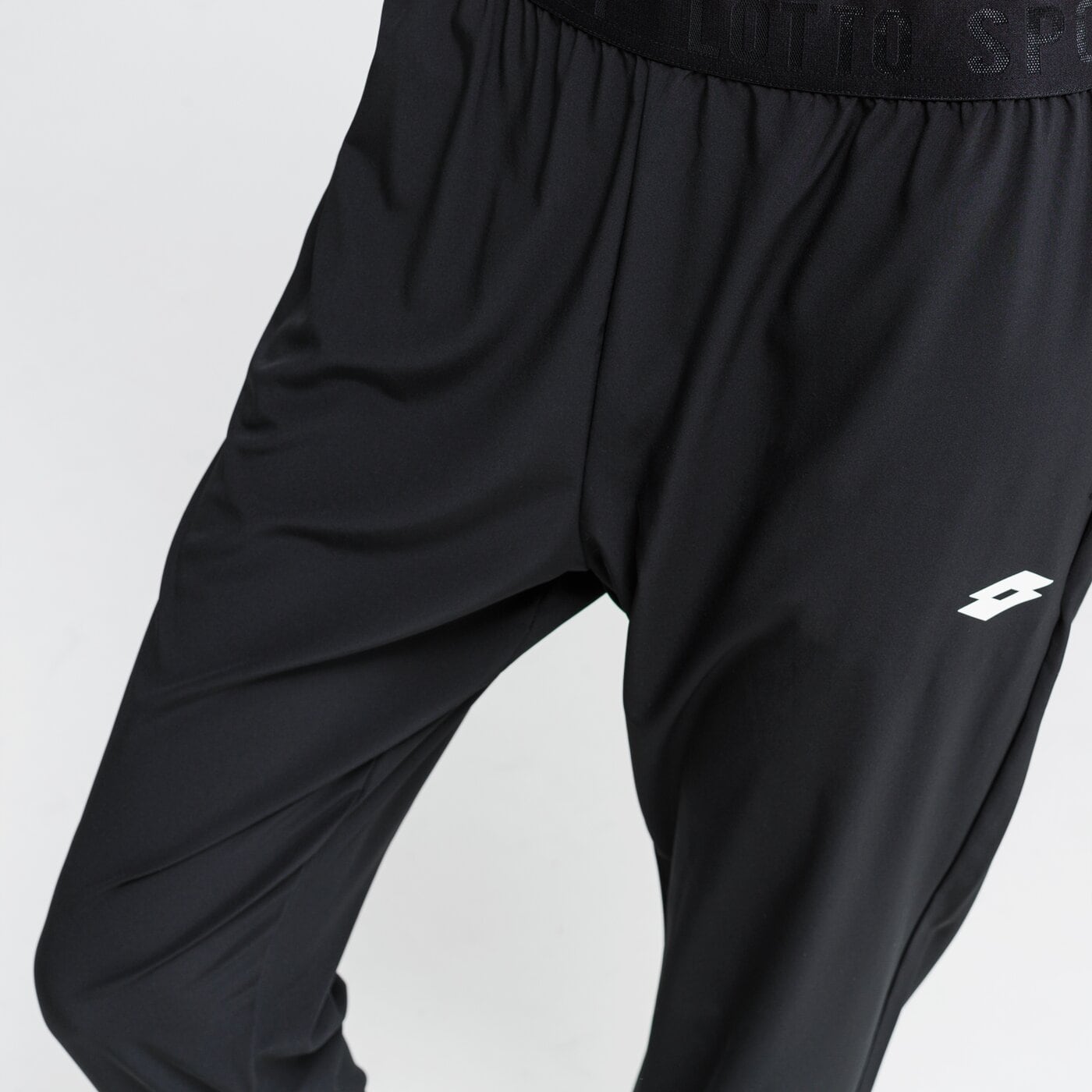 Spodnie dresowe damskie LOTTO SPODNIE VABENE W II PL 212951-1cl kolor czarny