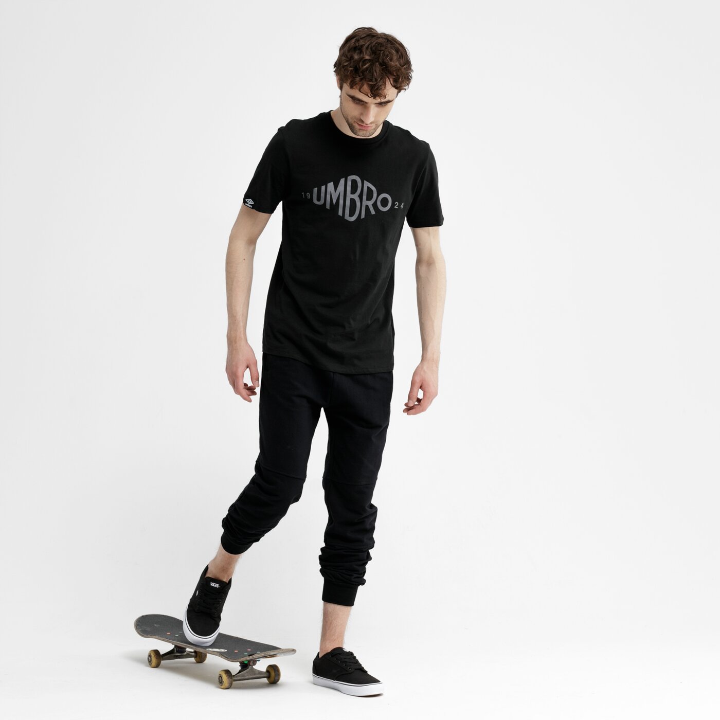 Spodnie dresowe męskie UMBRO SPODNIE OLTAN ul19spm24001 kolor czarny