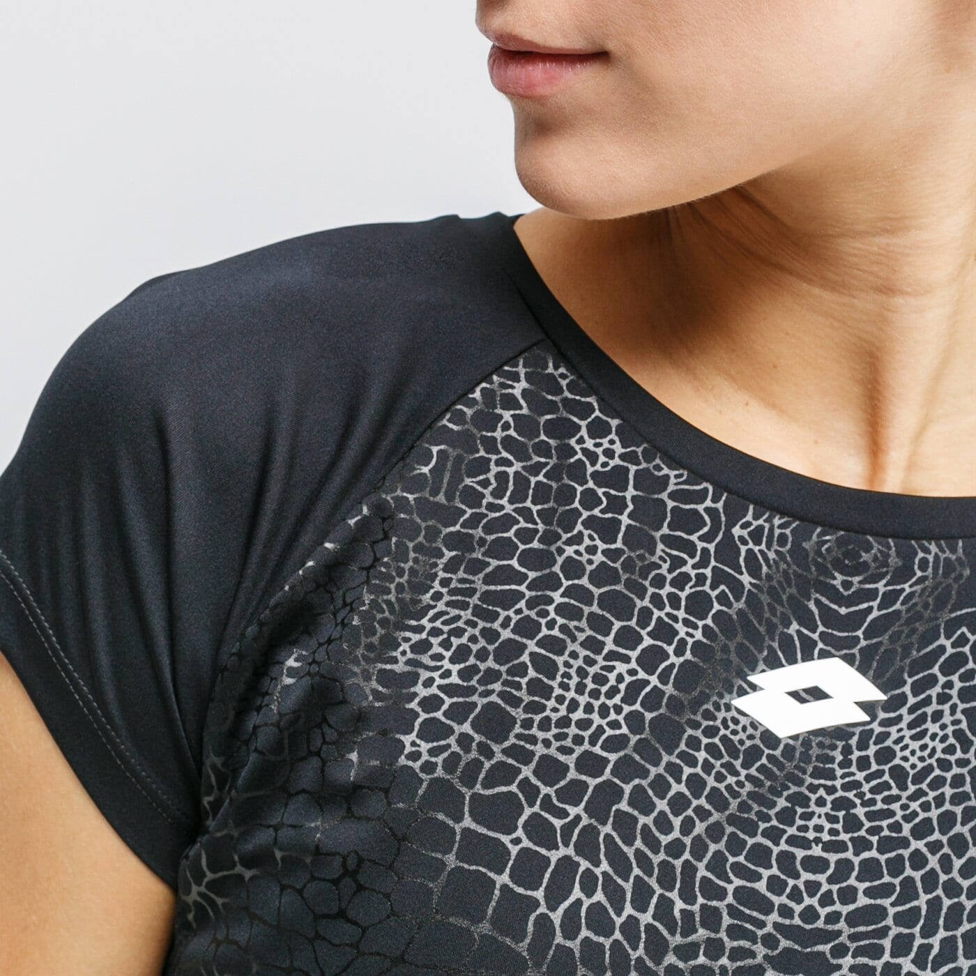 Koszulka damska LOTTO T-SHIRT VABENE W III PRT3 PL 214257-1cl kolor czarny