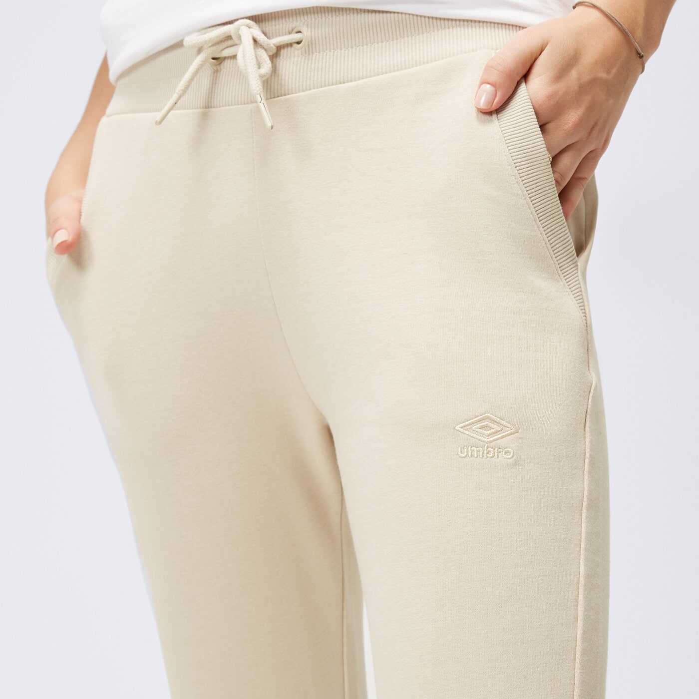 Spodnie dresowe damskie UMBRO SPODNIE AMOTTI ul323spd90003 kolor beżowy