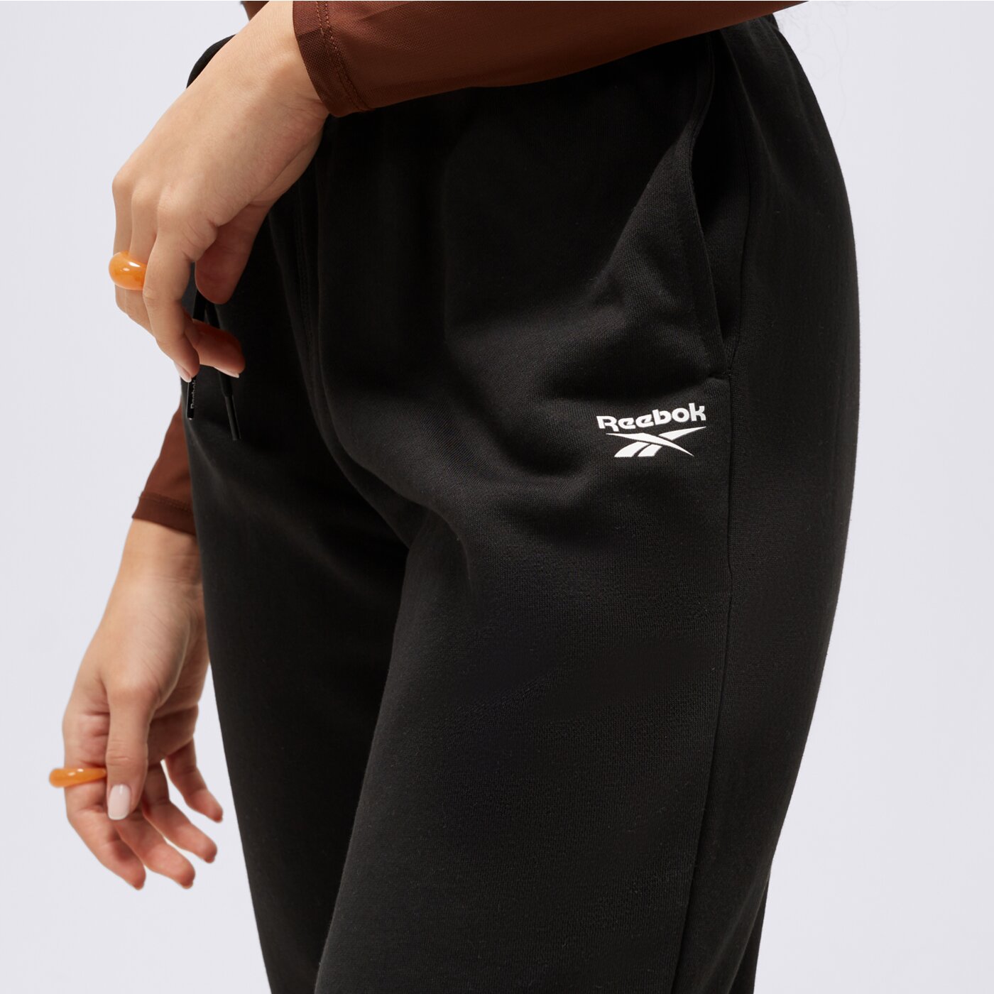 Spodnie dresowe damskie REEBOK SPODNIE REEBOK ID FLEECE 100012577 kolor czarny