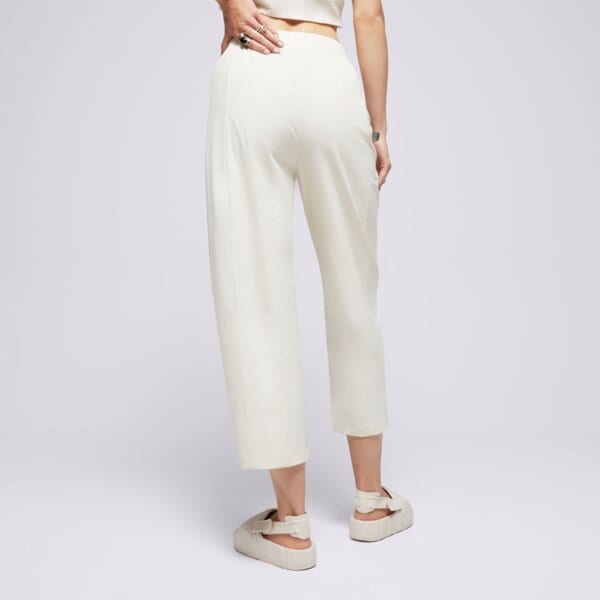 Spodnie dresowe damskie CHAMPION SPODNIE WIDE LEG ECO FUTURE 117110ys137 kolor beżowy