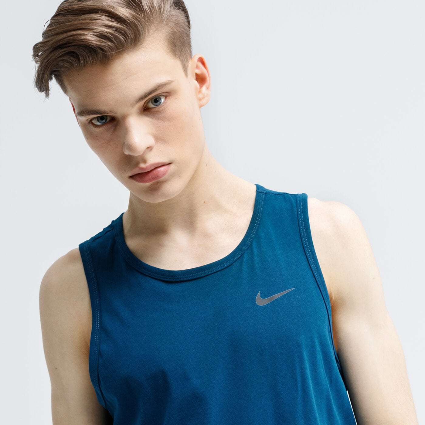 Tank top męski NIKE TANK M NK DRY DFC SOLID ar6069-432 kolor niebieski