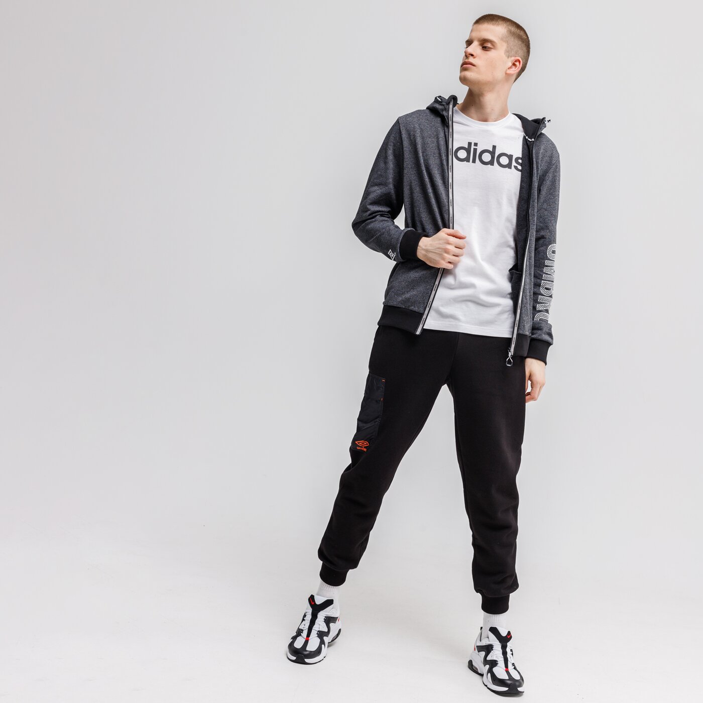 Spodnie dresowe męskie UMBRO SPODNIE DANNI ul121spm36001 kolor czarny