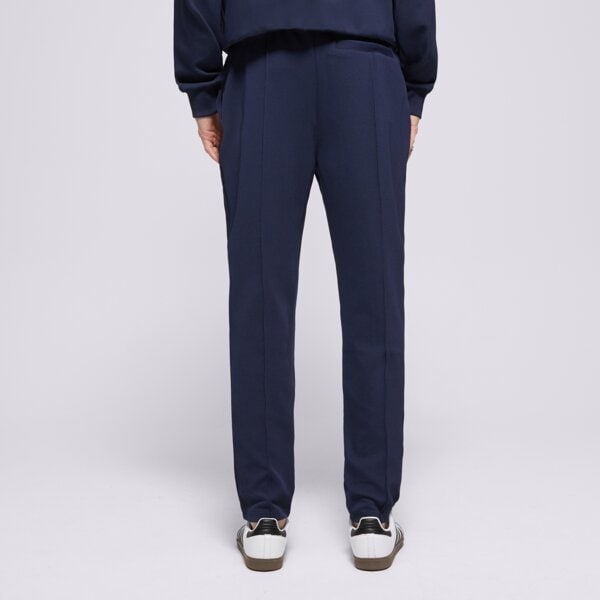 Spodnie dresowe męskie FILA SPODNIE PIN TUCK SLIM LEG PANT fw24mh035410 kolor granatowy