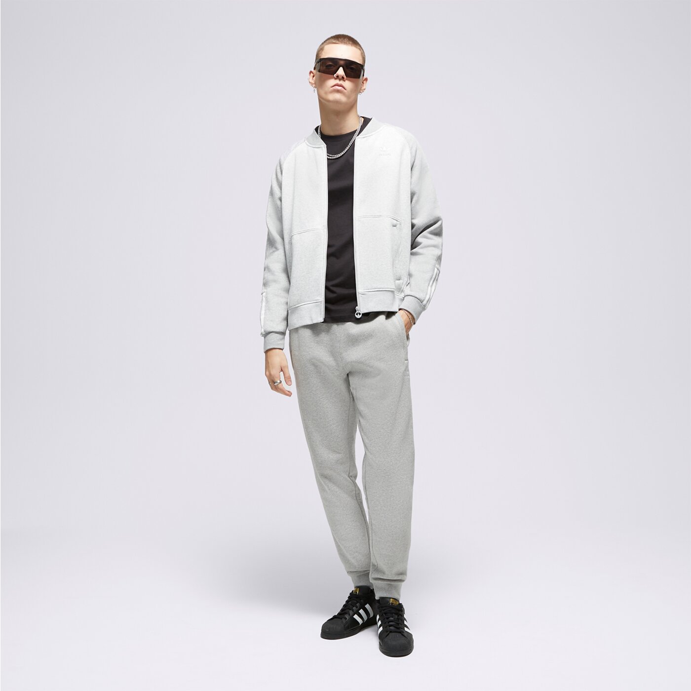 Spodnie dresowe męskie ADIDAS SPODNIE ESSENTIALS PANT ia4833 kolor szary