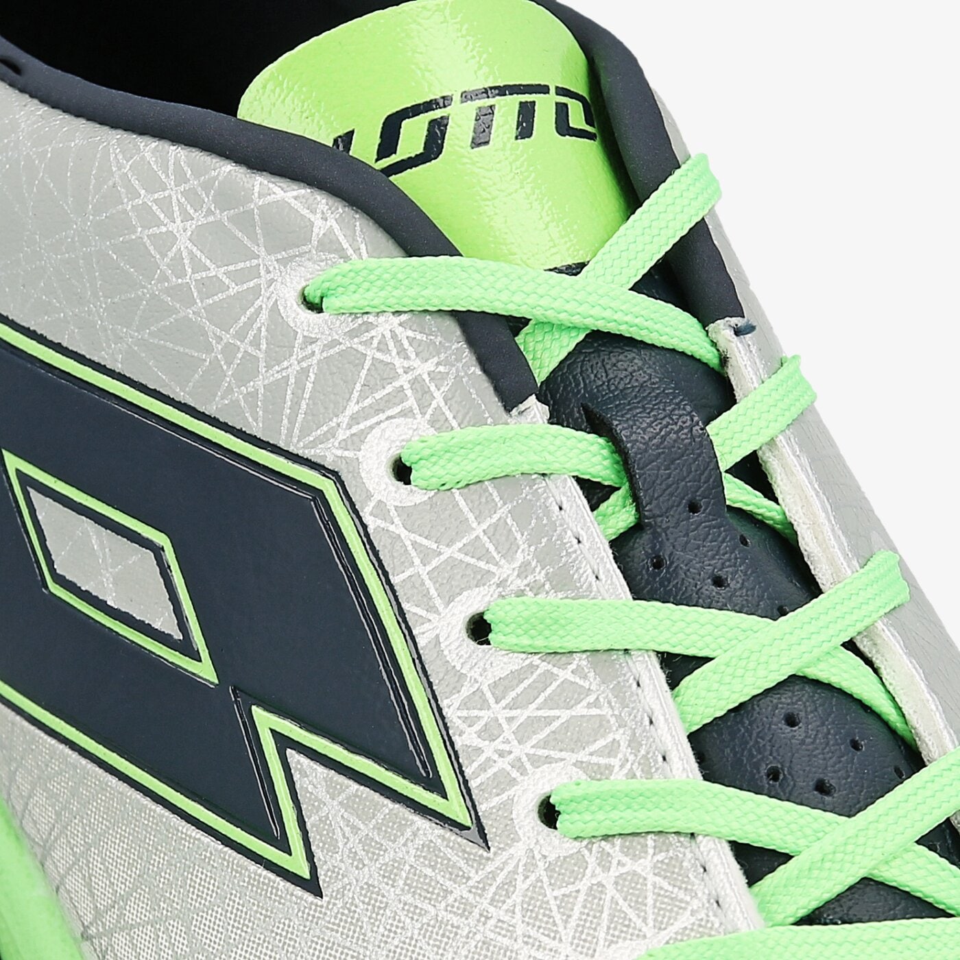 Buty piłkarskie dla dzieci LOTTO LZG VIII 700 TF JR s7192 kolor srebrny