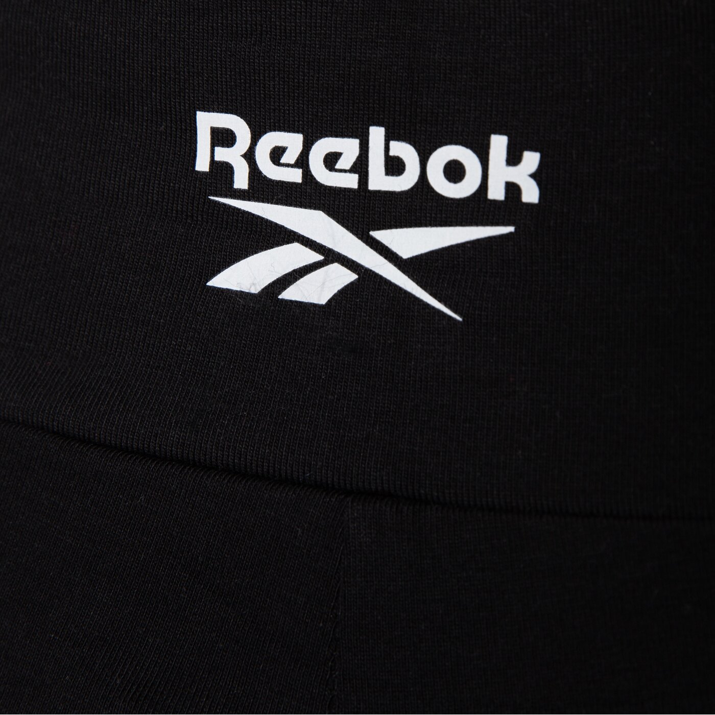 Spodnie dresowe damskie REEBOK LEGGINGS TARA SMALL LOGO FLARED 100240003 kolor czarny