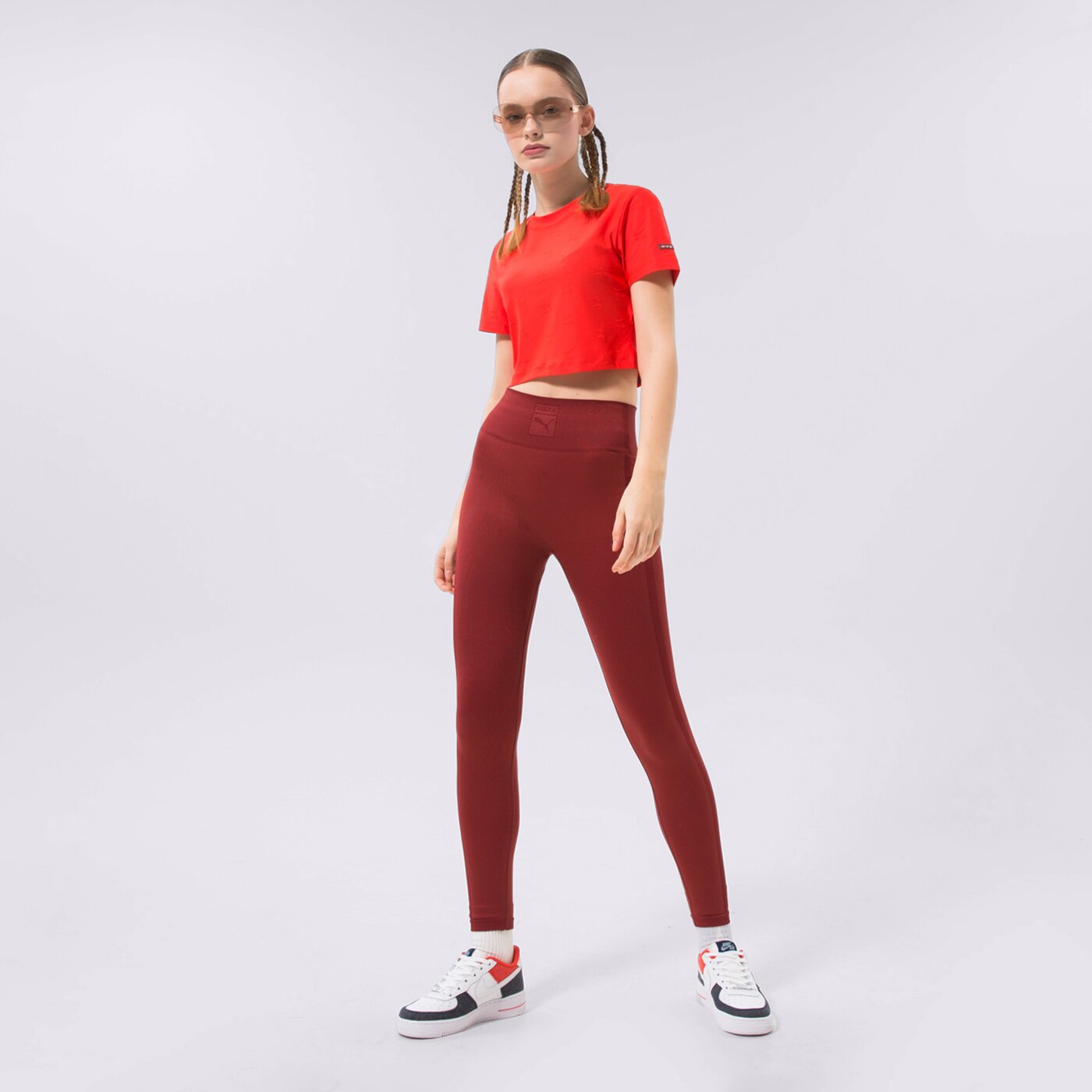 Spodnie dresowe damskie PUMA LEGGINGS PUMA X VOGUE SEAMLESS LEGGINGS 536694-22 kolor czerwony