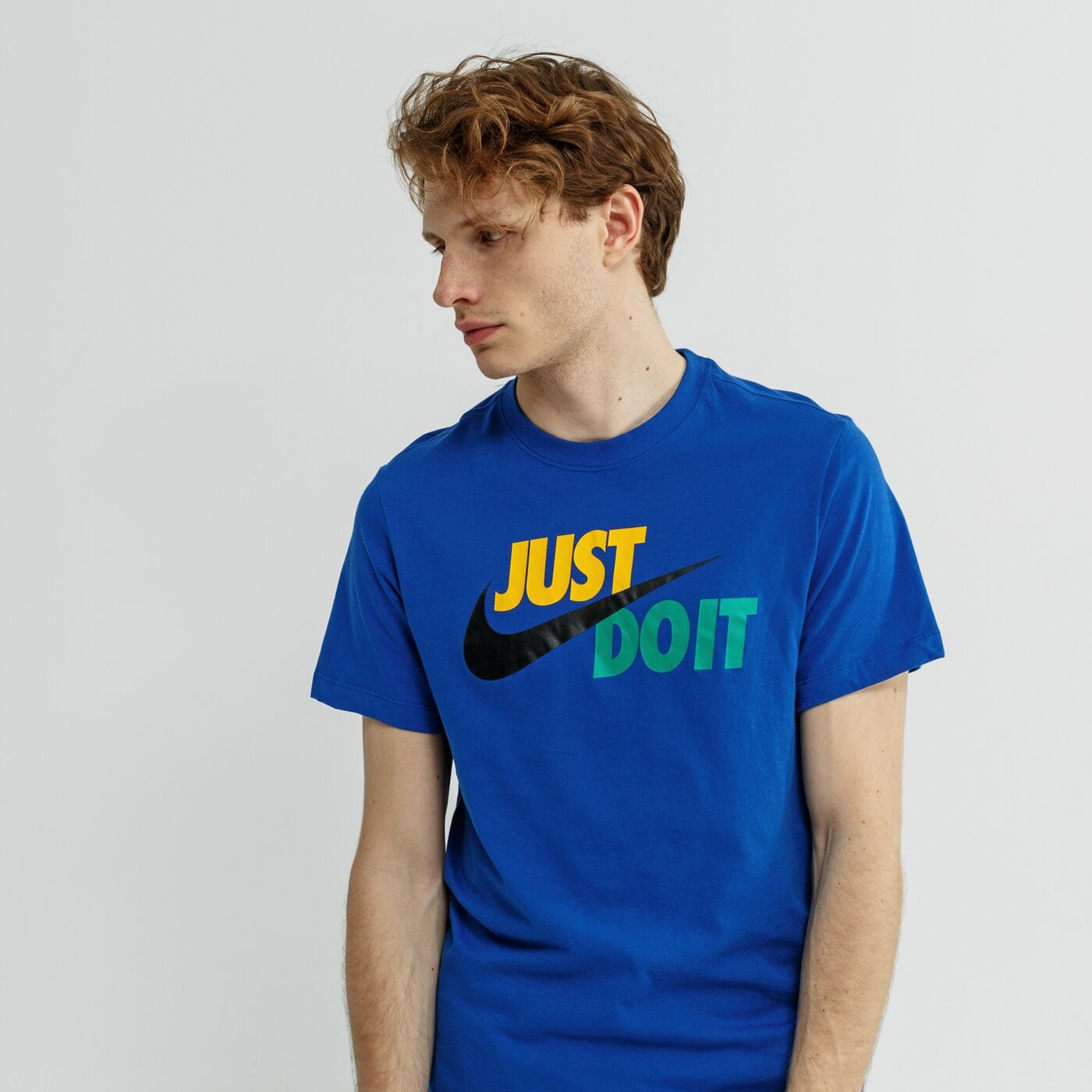 Koszulka męska NIKE T-SHIRT SS M NSW JUST DO IT SWOOSH ar5006-438 kolor niebieski
