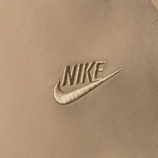 Spodnie dresowe męskie NIKE SPODNIE M NK CLUB WVN TAPER PANT hj1997-297 kolor beżowy