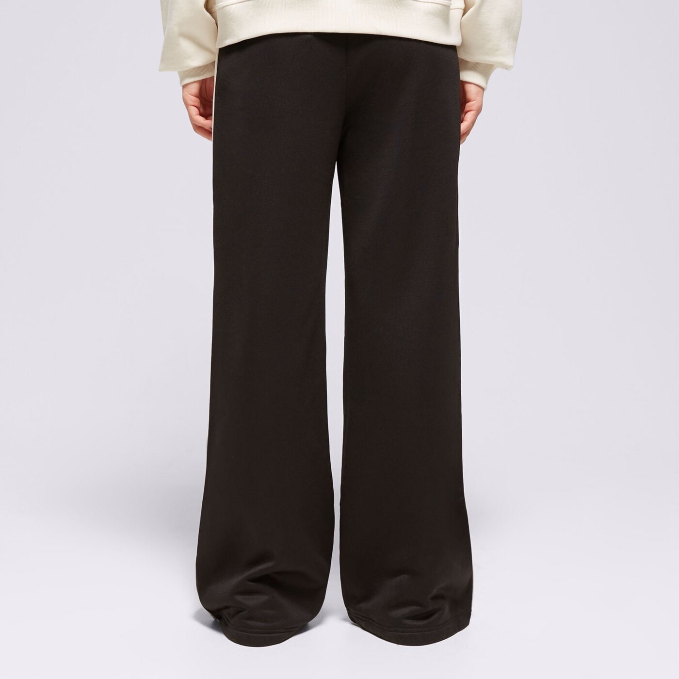 Spodnie dresowe damskie PUMA SPODNIE RELAXED TRACK 62502501 kolor czarny