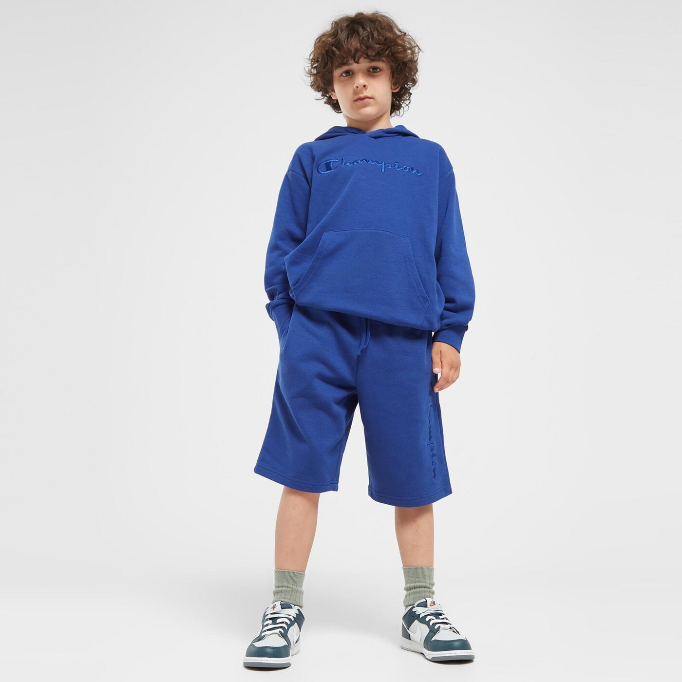 Spodenki dziecięce CHAMPION SZORTY BERMUDA B 306766bs559 kolor granatowy