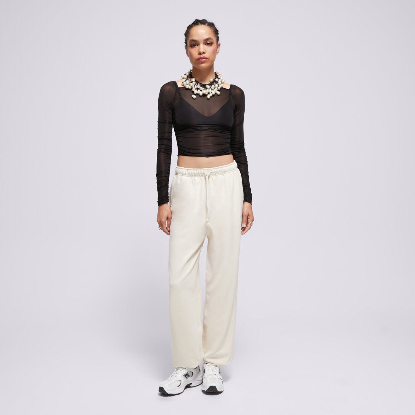 Spodnie dresowe damskie NEW BALANCE SPODNIE ATHLETICS FRENCH TERRY JOGGER wp41513lin kolor beżowy