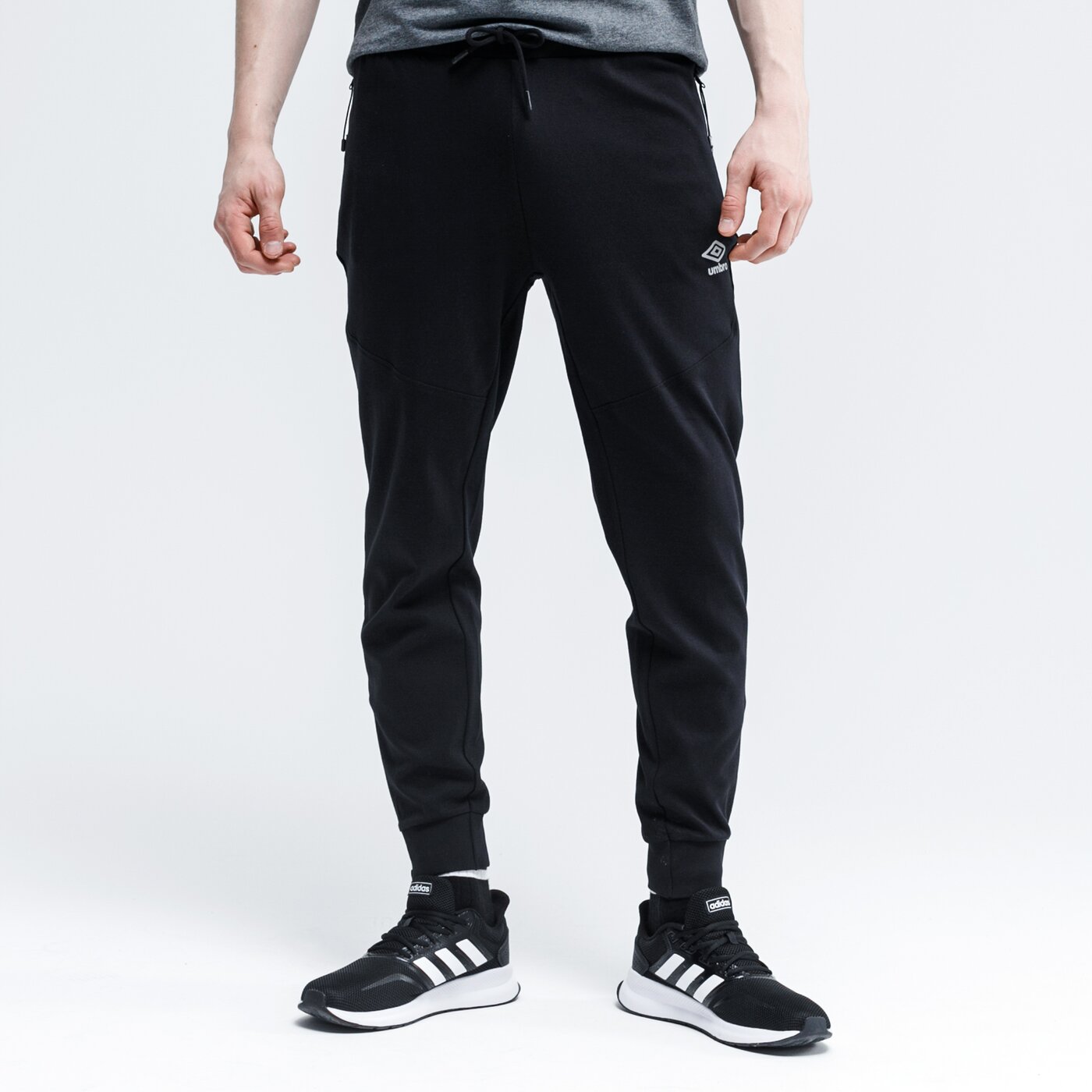Spodnie dresowe męskie UMBRO SPODNIE RADIGO ul120spm19001 kolor czarny