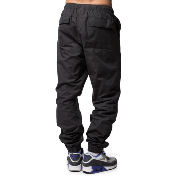 Spodnie dresowe męskie NIKE SPODNIE SWEEPER CUFF PANT 644841060 kolor szary