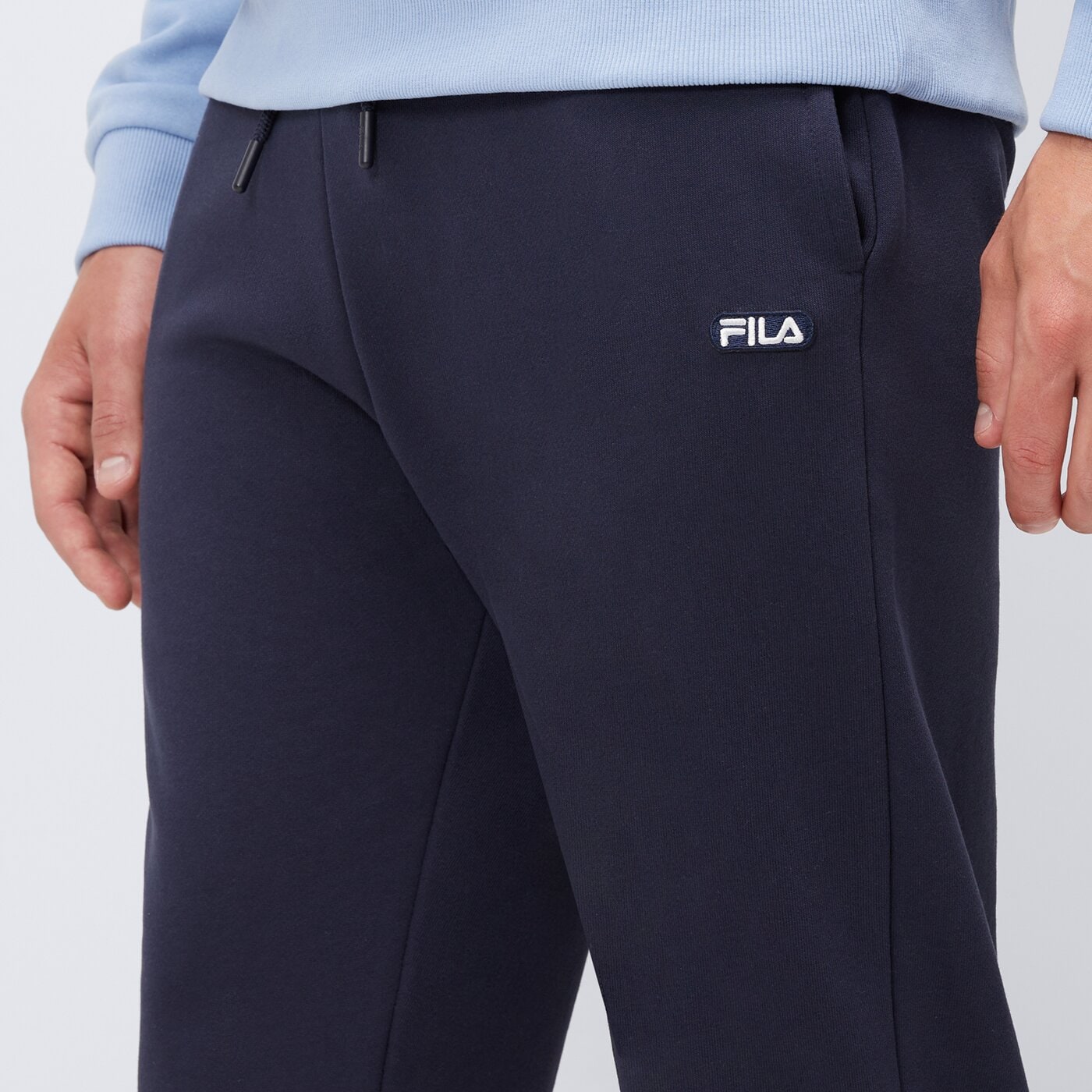 Spodnie dresowe męskie FILA SPODNIE RECO FT ss25spm059410 kolor granatowy