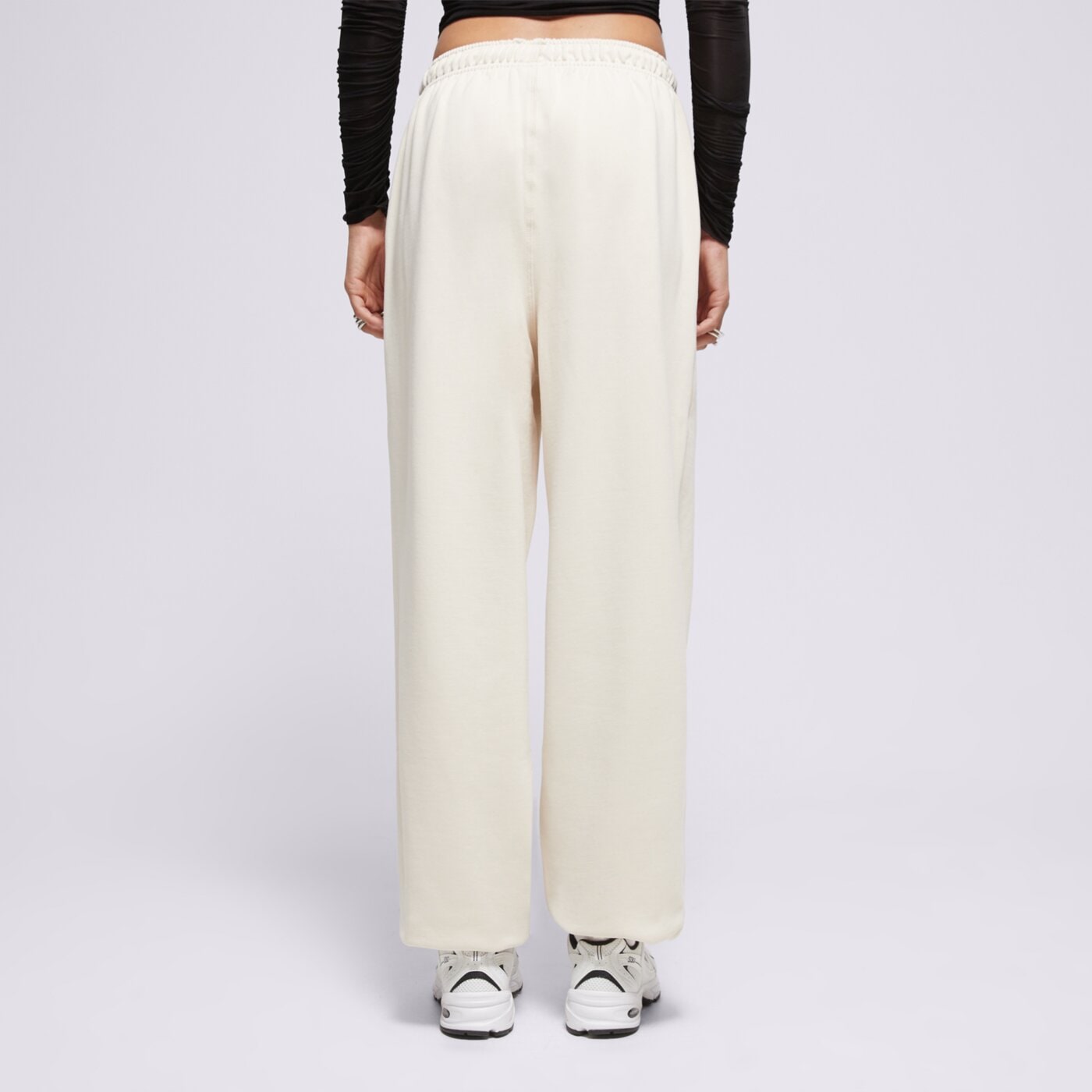 Spodnie dresowe damskie NEW BALANCE SPODNIE ATHLETICS FRENCH TERRY JOGGER wp41513lin kolor beżowy