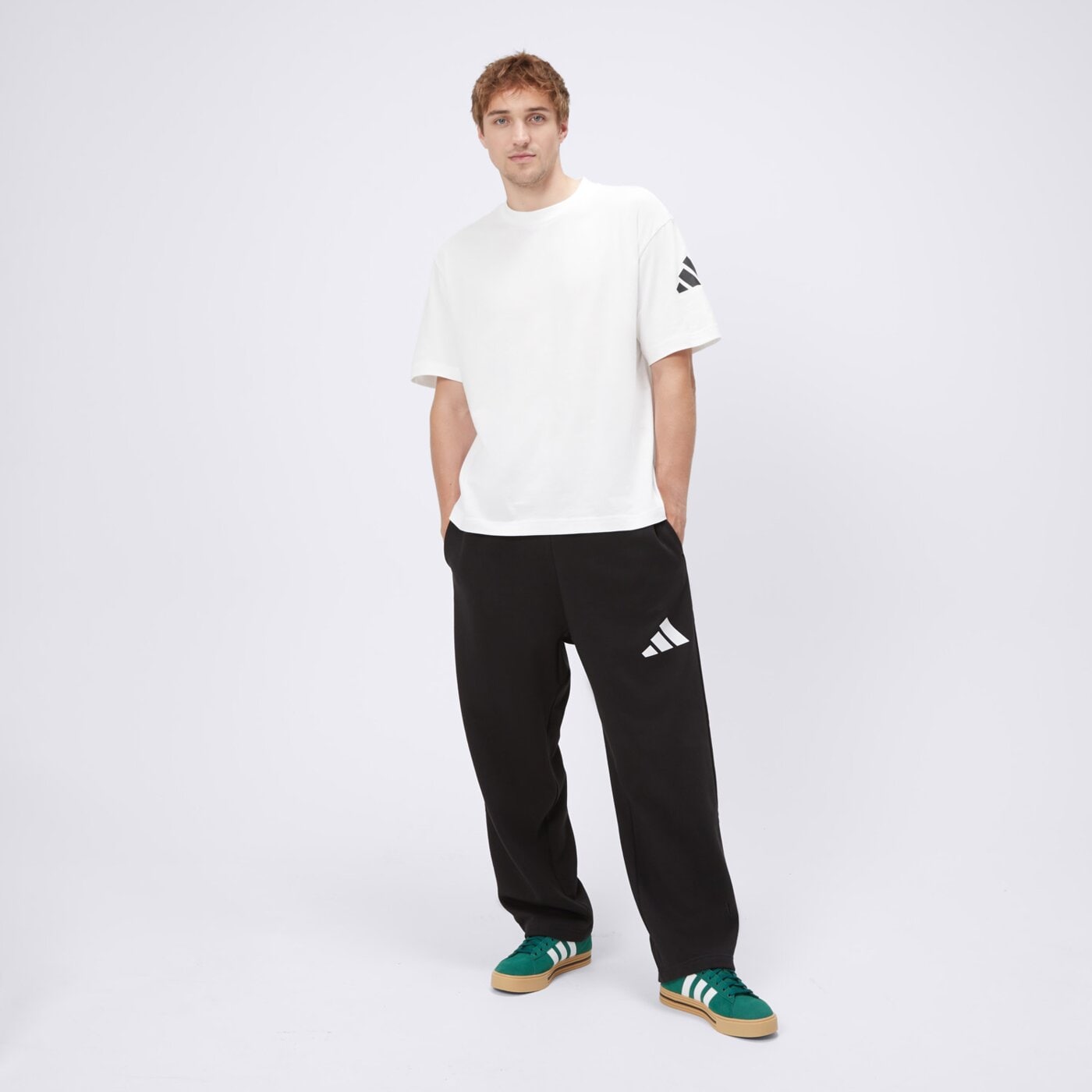 Spodnie dresowe męskie ADIDAS SPODNIE M WIDE PANT FL jf3567 kolor czarny
