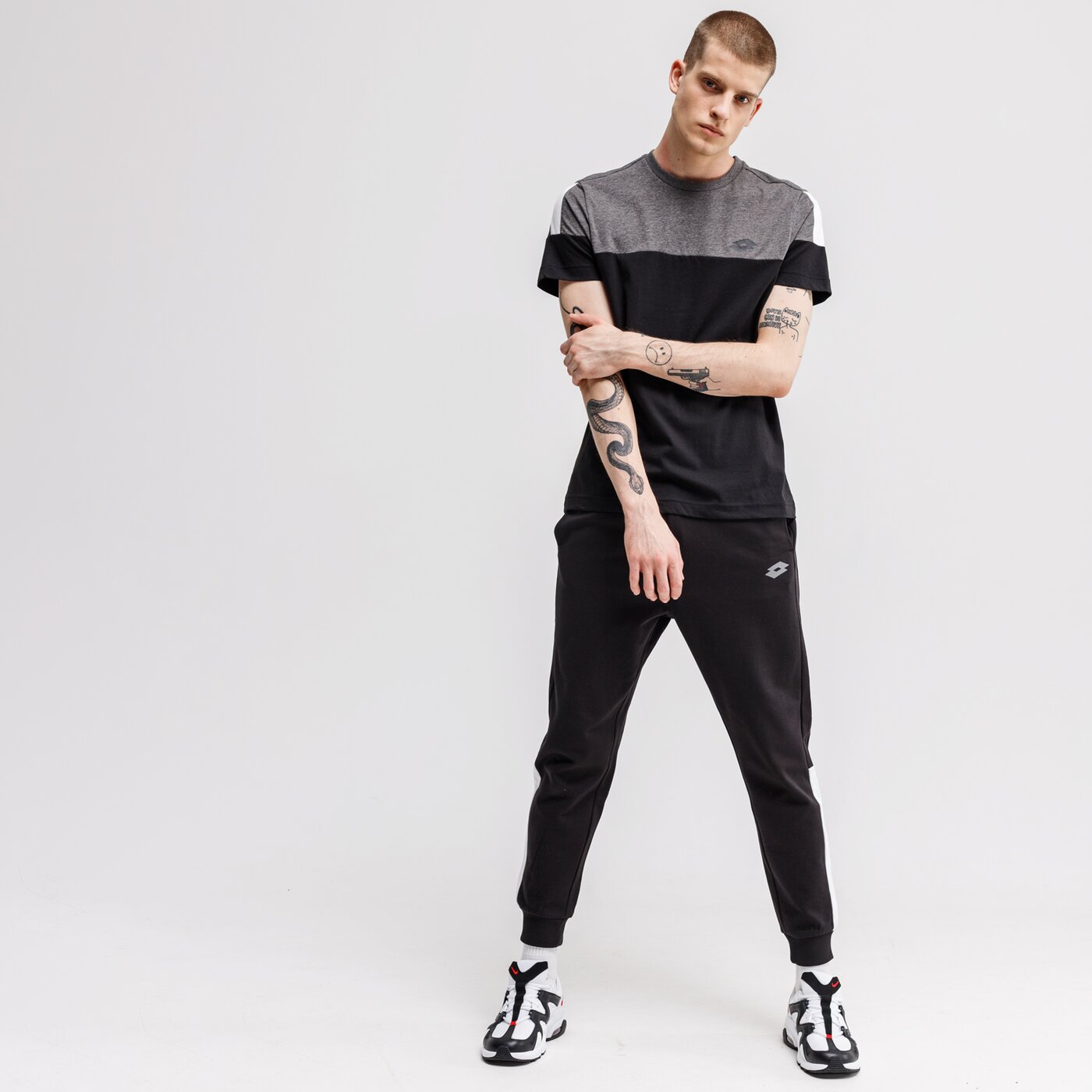 Spodnie dresowe męskie LOTTO SPODNIE DINAMICO III CUFF FL 214302-1cl kolor czarny