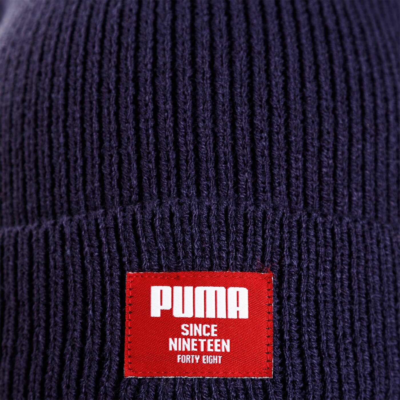 Czapka zimowa damska PUMA CZAPKA ZIMOWA RIBBED CLASSIC BEANIE 2170902 kolor granatowy