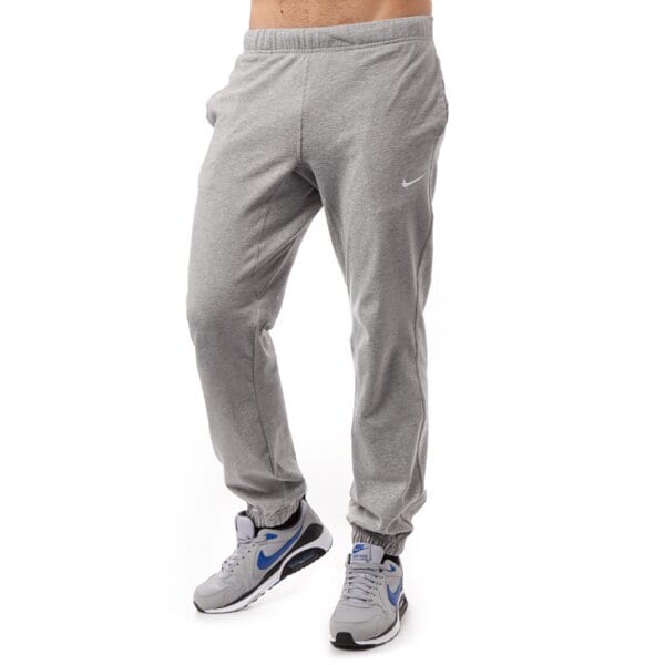 Spodnie dresowe męskie NIKE SPODNIE CRUSADER CUFF PANT 2 637764063 kolor szary