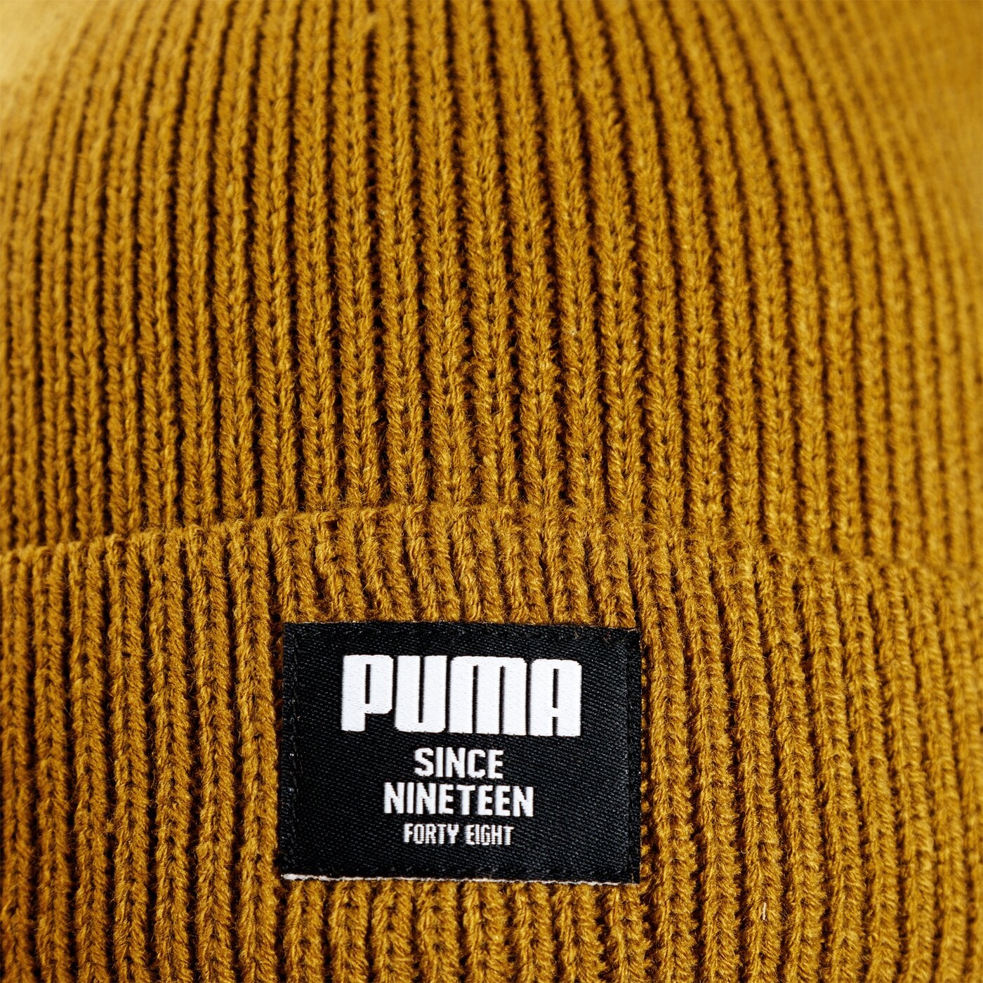 Czapka zimowa damska PUMA CZAPKA ZIMOWA RIBBED CLASSIC BEANIE 2170906 kolor musztardowy