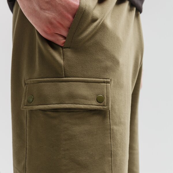 Spodenki męskie PUMA SZORTY REBEL BOLD 9" 581376 49 kolor khaki