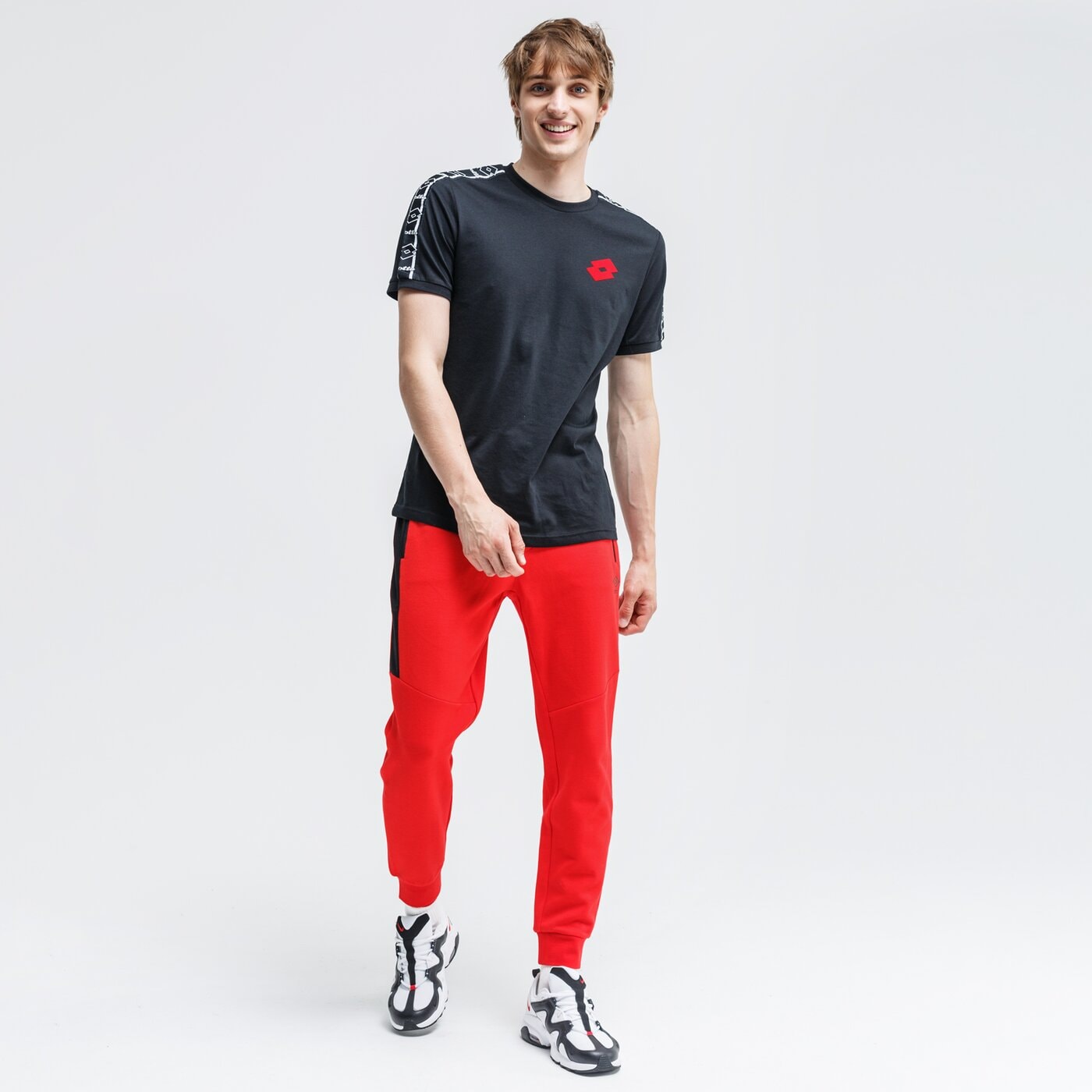 Spodnie dresowe męskie UMBRO SPODNIE ANDY ul320spm06002 kolor czerwony