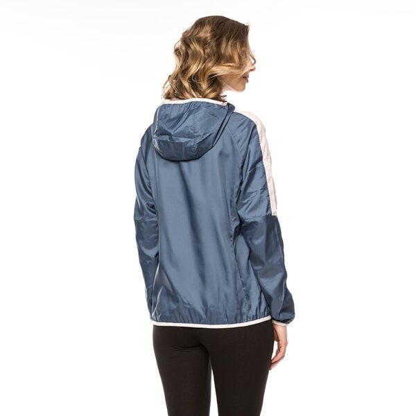 Kurtka przejściowa damska PUMA KURTKA FUN SOLID WINDBREAKER 83649023 kolor granatowy