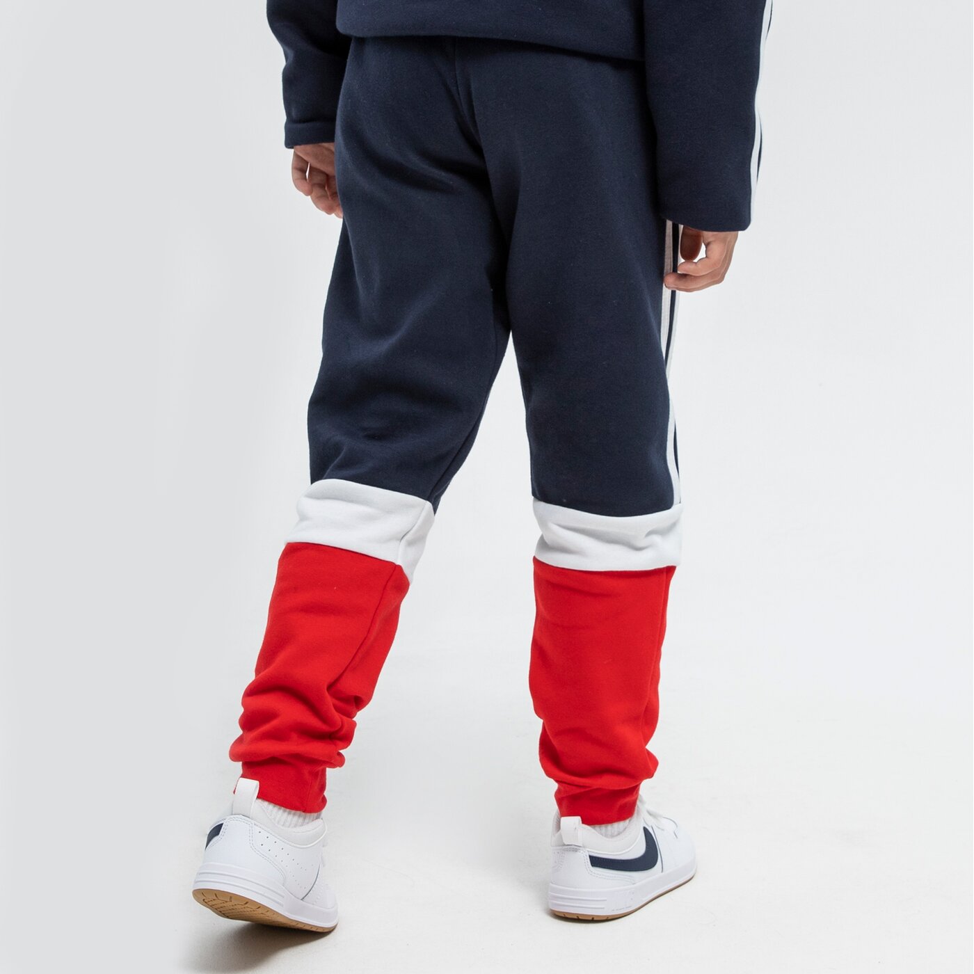 Spodnie dziecięce ADIDAS SPODNIE B CB FL C PT BOY gs8875 kolor granatowy