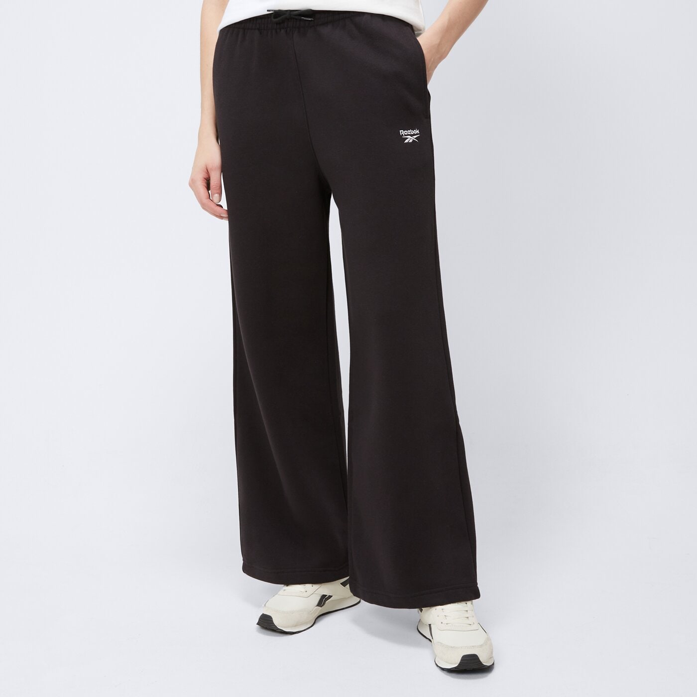 Spodnie dresowe damskie REEBOK SPODNIE IDENTITY SL FLC WIDE LEG 100208504 kolor czarny