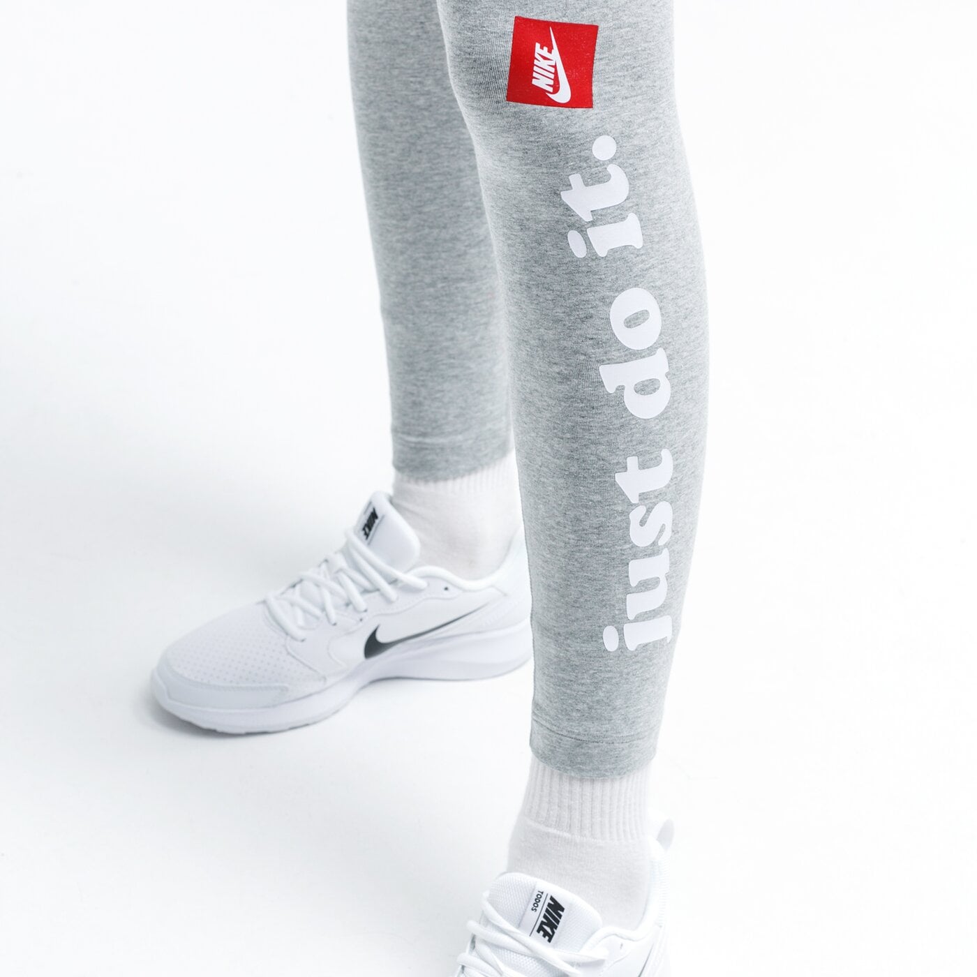 Spodnie dresowe damskie NIKE LEGGINGS SPORTSWEAR cj1994-063 kolor szary