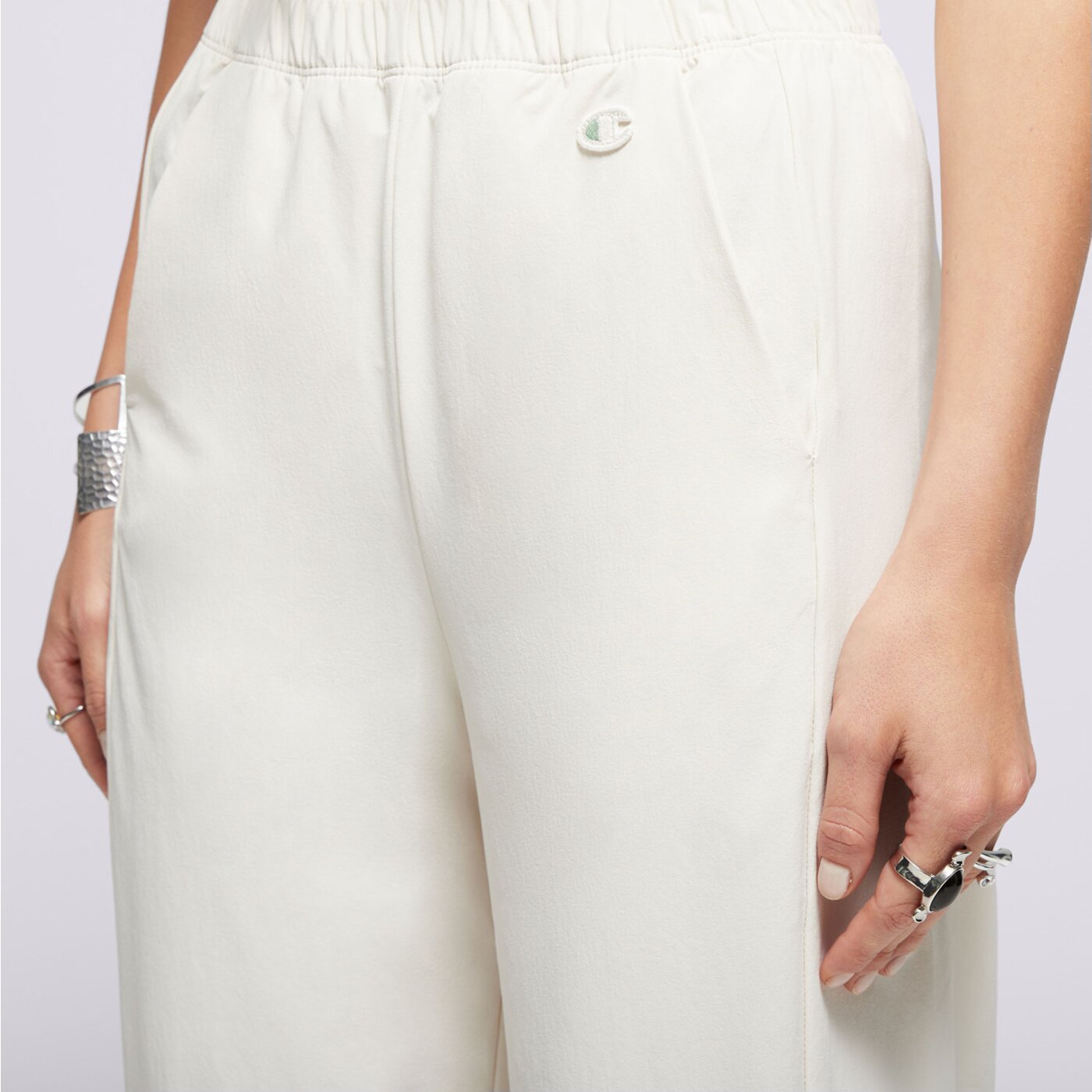 Spodnie dresowe damskie CHAMPION SPODNIE WIDE LEG ECO FUTURE 117110ys137 kolor beżowy