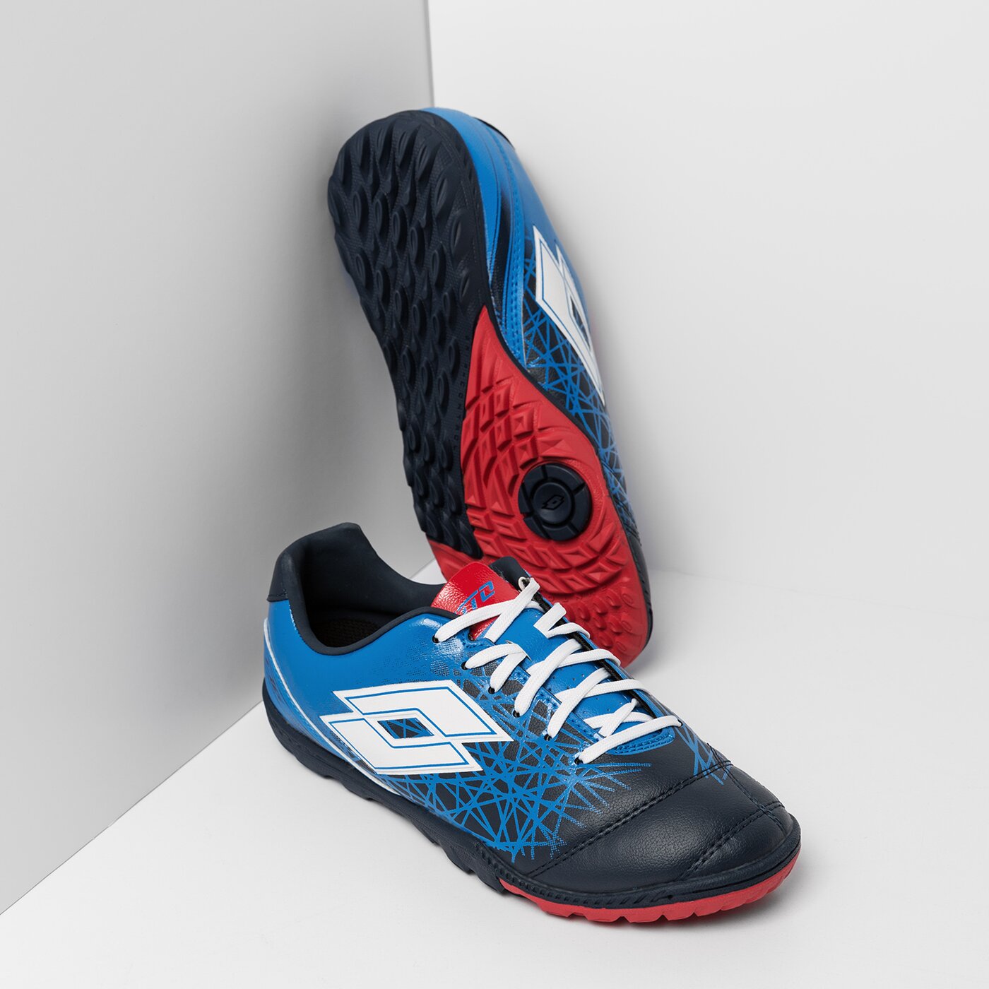 Buty piłkarskie dla dzieci LOTTO LZG 700 IX TF JR s9685 kolor niebieski