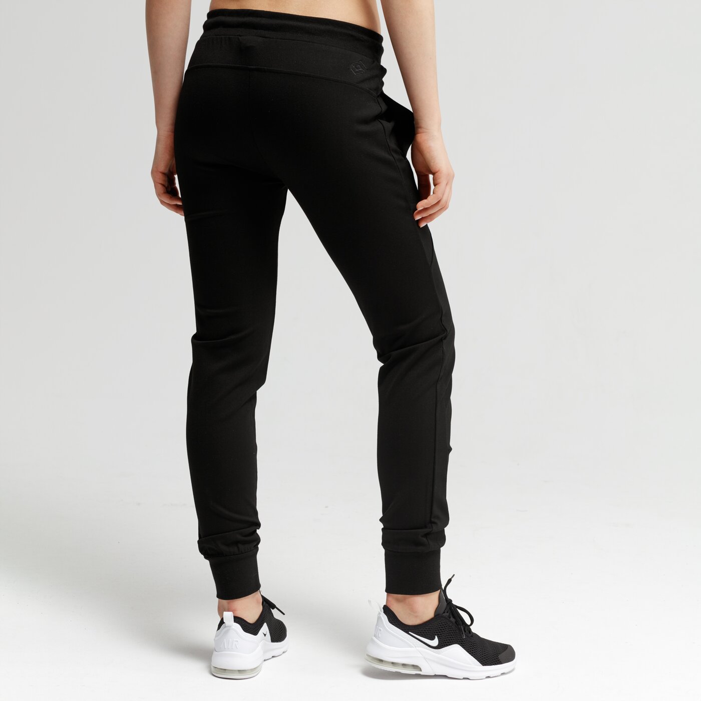 Spodnie dresowe damskie LOTTO SPODNIE ZUG lo19spd21001 kolor czarny