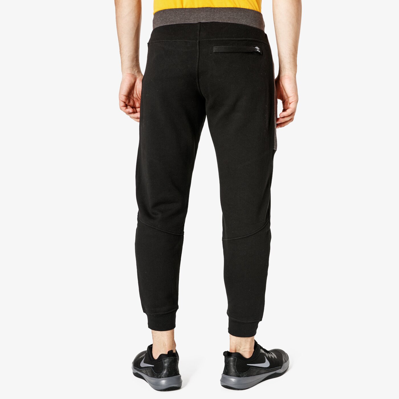 Spodnie dresowe męskie UMBRO SPODNIE PYRITE ul38spm03001 kolor czarny