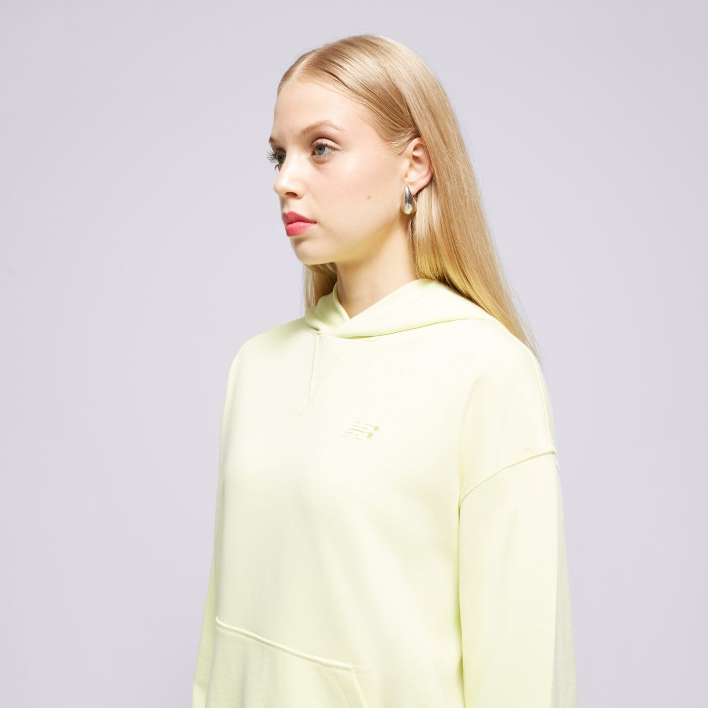 Bluza damska NEW BALANCE BLUZA Z KAPTUREM NB ATHLETICS FT wt41537llt kolor żółty