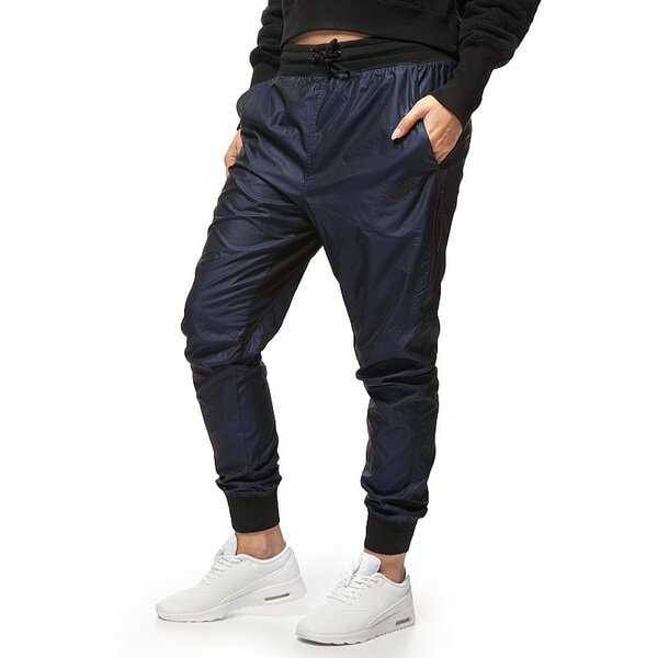 Spodnie dresowe damskie NIKE SPODNIE WOVEN PANT T2 684923410 kolor granatowy