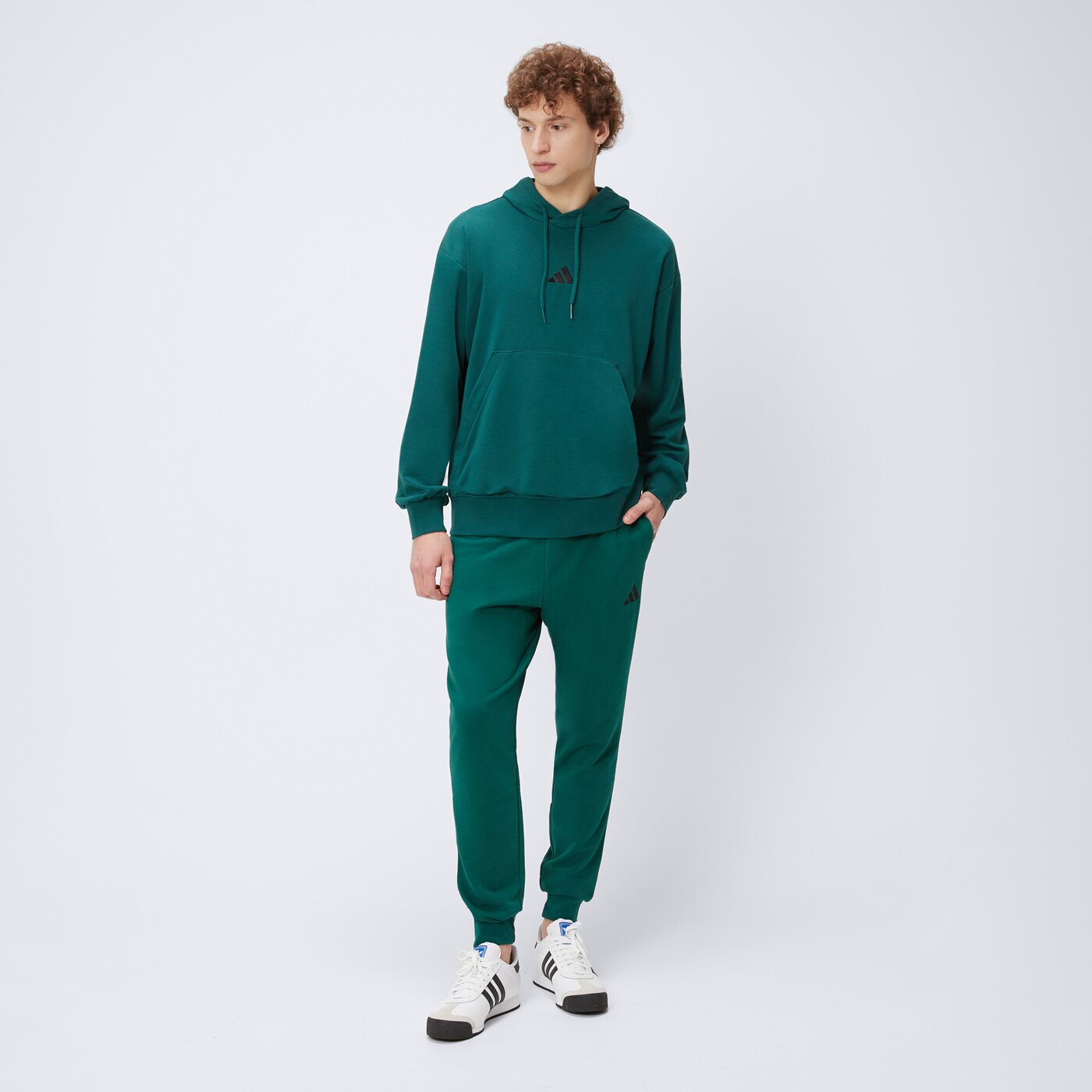 Spodnie dresowe męskie ADIDAS SPODNIE M FEELCOZY PANT je3858 kolor zielony