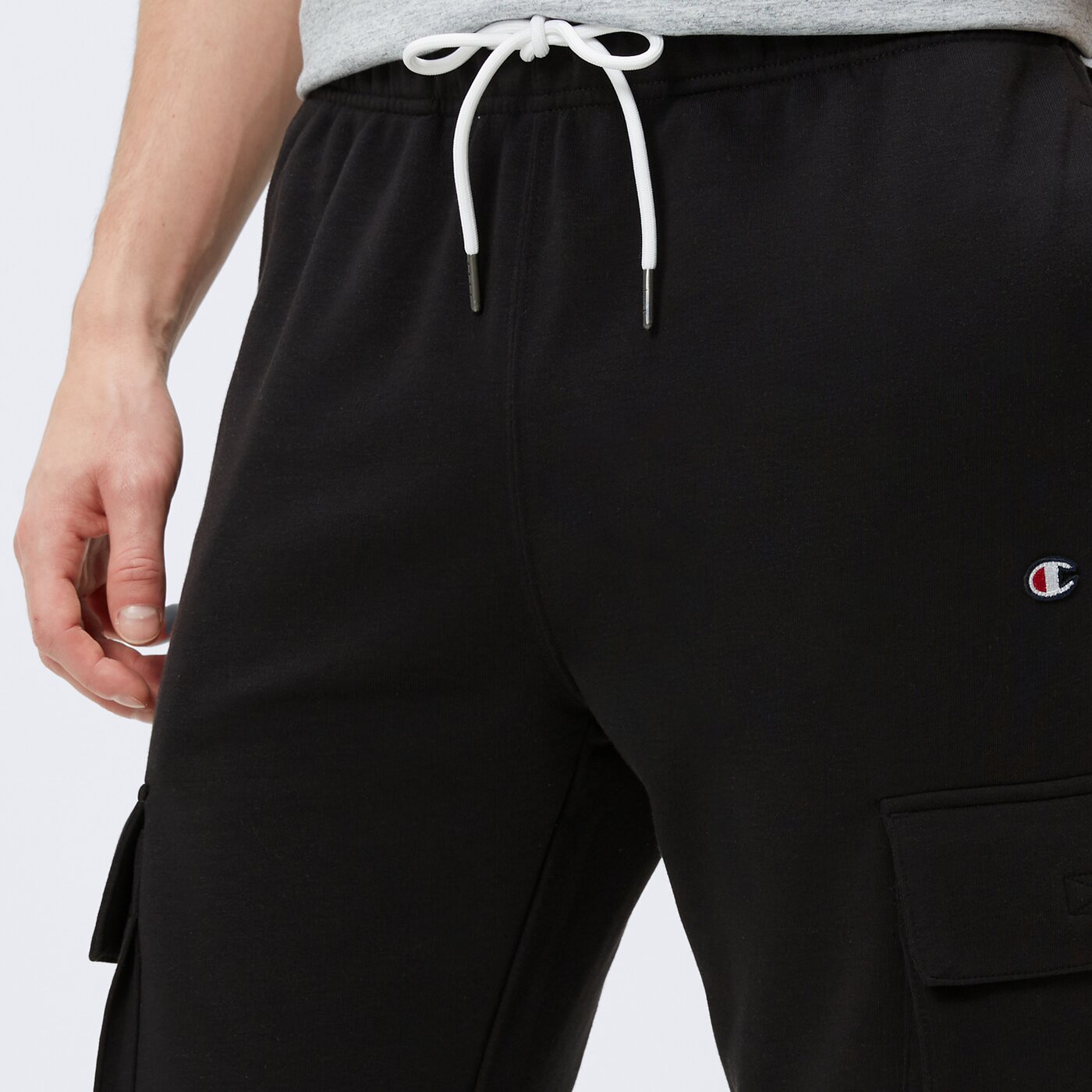 Spodnie dresowe męskie CHAMPION SPODNIE RIB CUFF CARGO PANT 219898kk001 kolor czarny