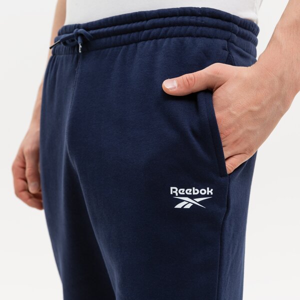 Spodnie dresowe męskie REEBOK SPODNIE RI LEFT LEG JOGGER hh8325 kolor granatowy