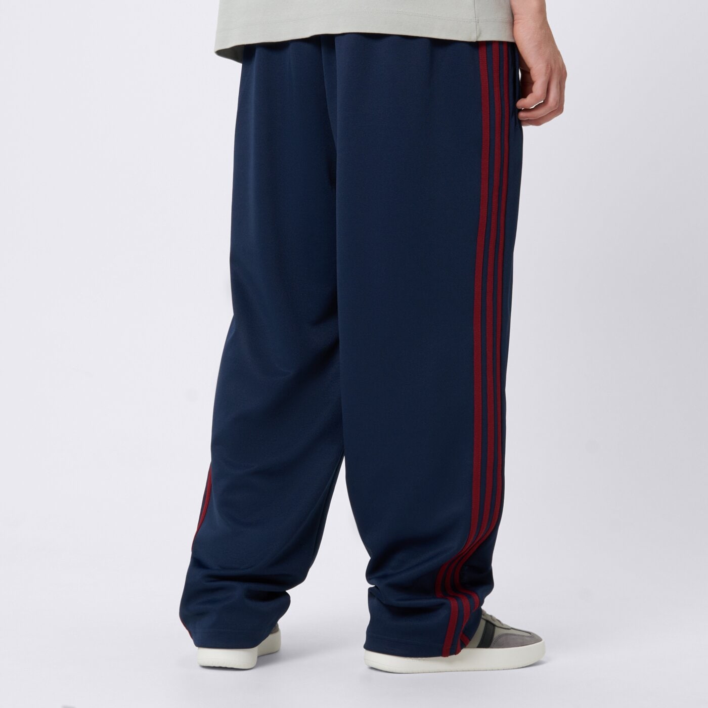 Spodnie dresowe męskie ADIDAS SPODNIE FIRST TP kd9117 kolor granatowy