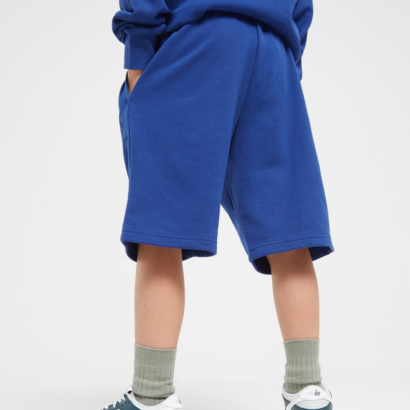 Spodenki dziecięce CHAMPION SZORTY BERMUDA B 306766bs559 kolor granatowy